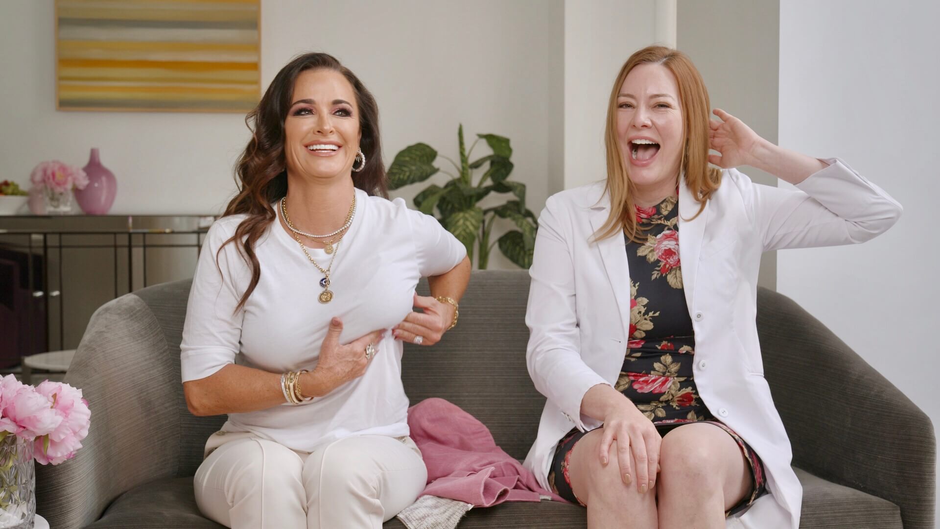 Kyle Richards, founder of the Kyle Richards Mammogram Day philanthropy event is demonstrating a breast self exam with Breast Cancer Surgeon, Beverly Hills, CA